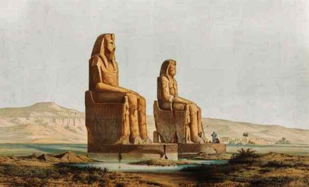 The great statues of Amenhotep III seem higher than the hills.