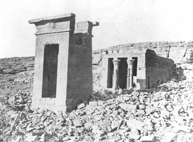 The temple at Dandour (Dendur) was built in a rocky desert, set against a hillside.